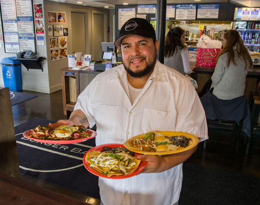 Burger Bar - kitchen cook delivering meal